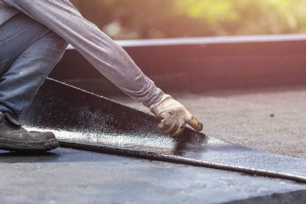 Professional Waterproofing technician working in Winchester, KY